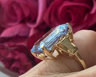 D- $475 - Emerald cut blue topaz on 10kt yellow gold Art Deco setting. 10.4 grams (size 6 3/4)