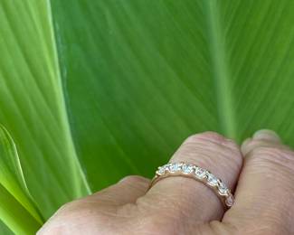 A- $360 - 1/2 ctw, 7 diamonds on 14kt gold band. 1.9 gr. sz 7 