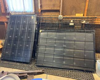 Several large dog crates. 