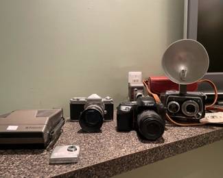 SiPix,  Nikon Nikkormat,  Nikon N50, Bell & Howell 8mm Graflex 22
