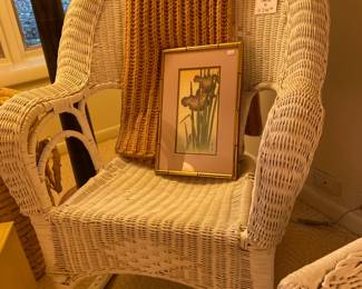 Wicker rocking chair B, threshold blanket, framed art