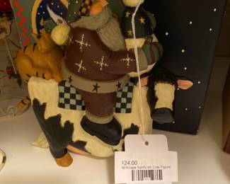Williraye Santa on Cow Figure