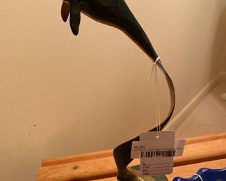San Pacific international dolphin sculpture