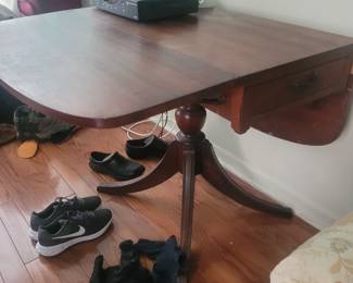 Drop leaf table with a drawer