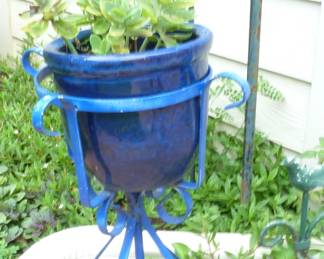 blue planter and stand