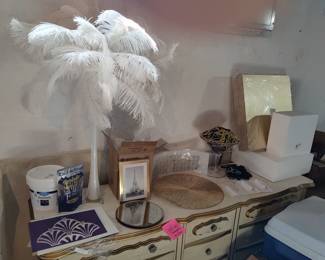 Square cake forms 14x14 and a 10x10 cake stencils mirrors faces with feathered tops with LED lights.