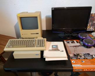 Mac computer with keyboard mouse external hard drive and books $300 or best offer