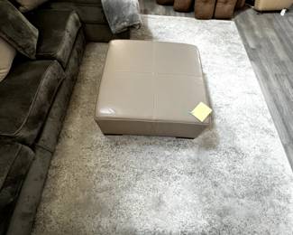 Square Leather ottoman and lovely rug