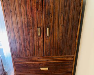 Dresser or Entertainment Center.  Perfect for storing a fluffy pillow on top of it.  
