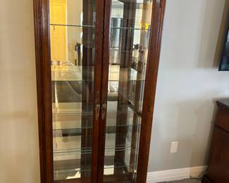 Large curio cabinet so you can display even more knickknacks.  