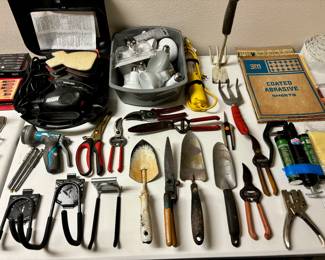 Garden tools or something for the secret basement room.