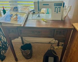 Because having only one sewing machine just won't do,  