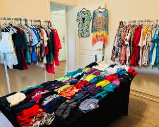 Welcome to the clothing department at our sale.  Over 300 women's tops in stock.  Enjoy the next set of photos.  