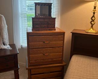 Save space.  Stack the nightstands and call it a chest.