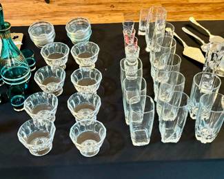 Or just add to the bar collection in general.  Too many glasses?  Remind her of the shoes in the closet.