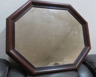 Framed mirror.