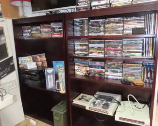 DVDs, large HP monitor.