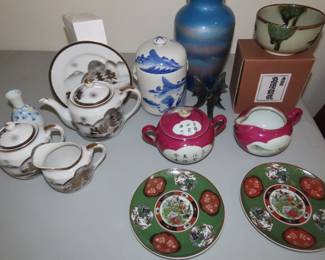 Asian tea set, vases, ginger jar and plates.