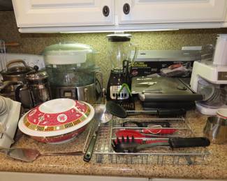 Kitchen utensils. Rotisserie, steamer, Cuisinart processor, panini maker.