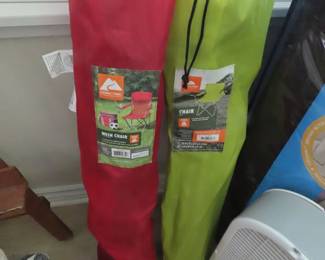 Two beach/camping folding chairs.