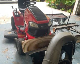 Craftsman riding mower - less than two years old with accessories