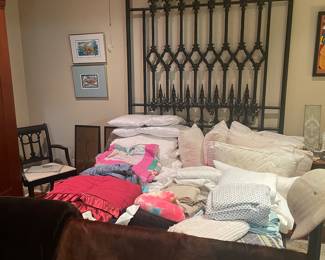 Cowhide rug
Bed linens
Gothic iron bed