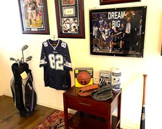 Sports wall.  Ping cart bag and complete set of ladies ping irons. Several rare, autographed photos.  A very collectible Jason Whitten jersey. Cooperstown bat.