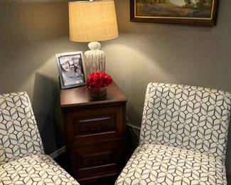 Two door wooden file cabinet. Original signed and framed wall painting.