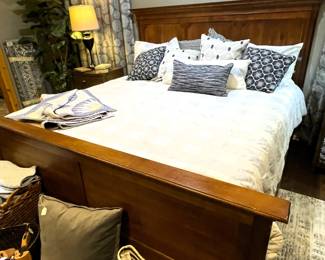 Fully adjustable king size Tempur-Pedic with dual remotes, headboard and footboard. 