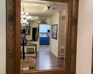 Large, beveled glass wall mirror