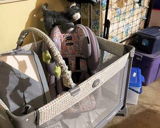 Folding Graco Play Yard, extra thick mattress, bassinet attachment and carrying case.  Britax heavy infant/child car seat.