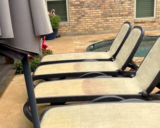 Folding deck chairs.  Deck umbrella with weighted stand