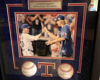 Very rare autographed baseballs by Michael Young and Mavericks Dirk Nowitzki. 