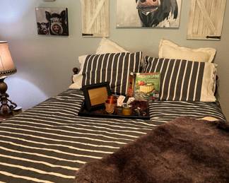 Full size bed in a vintage headboard/footboard.