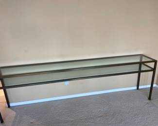 $600 Brushed brass and glass console table. 96"w X 15"d X 29"h.