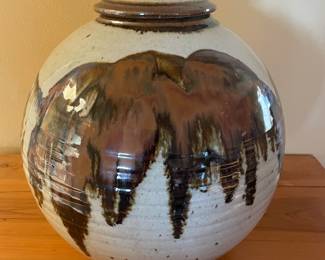 $140 NW Studio artist Gerald Newcomb, Hand painted signed urn . 14" dia. X 14.5"h.