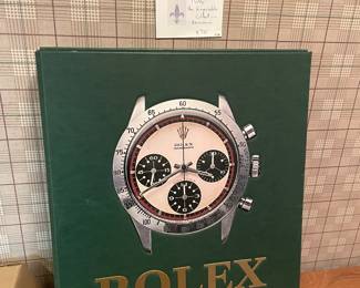 $700 Collectable Rolex book complete with outer box.