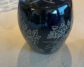 $60 White floral motif on black garden stool. 14" dia. X 17"h.