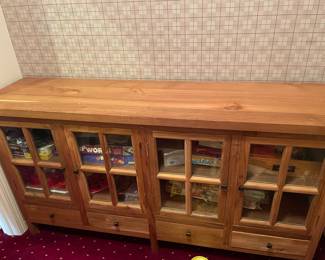$320 Console storage chest. Four drawers and two cabinets. 69"w X 18"d X 37"h.