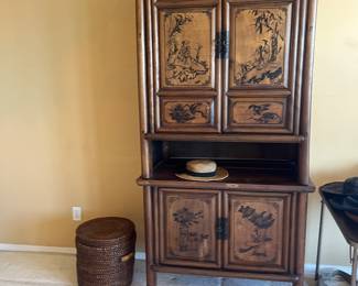 $800 Two-piece Chinese chest with sumi ink painted doors. Bottom piece measures 23"d X 29.25"w X 32.25"h the top piece is 22.25"d X 37"w X 48"h. Overall height is 80". Unique piece that can be stacked together or used separately. Orig. $1,500