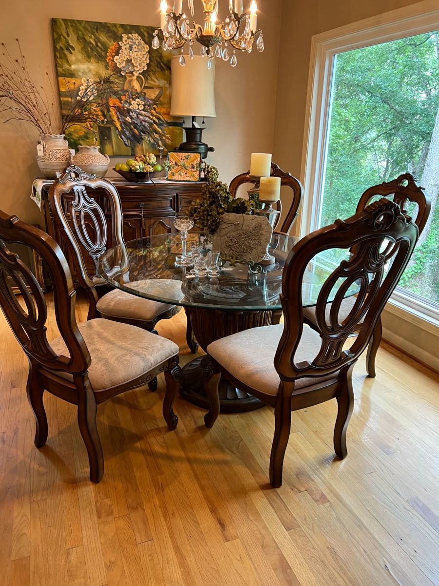 Round glass top table with 5 matching chairs