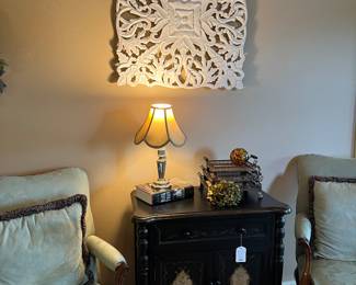 Upholstered armchairs, painted black chest, accessories 