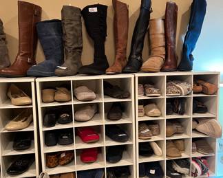An array of lady's boots and shoes, size 7