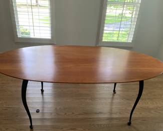 large oval dining table with iron legs