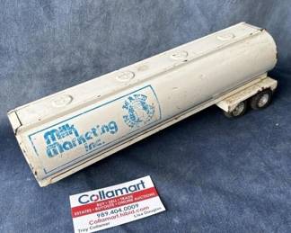 Vintage metal milk truck toy