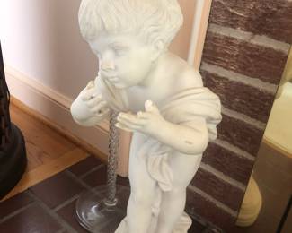 Tall marble statue of a young girl