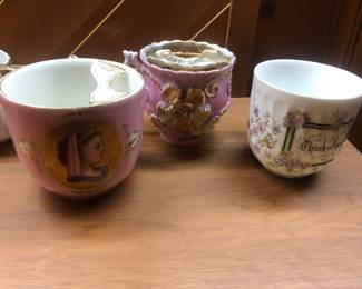 Antique mustache mugs