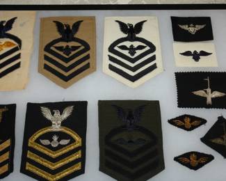 Assortment of WWII Navy clothing insignia 