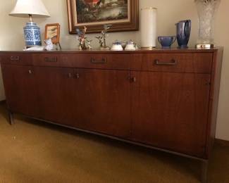 MCM Beautiful walnut buffet with bronze trim base