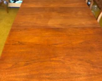 Photo of wood dining table with all leaves